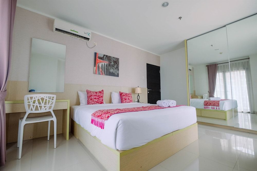 undefined Cozy 2BR Apartment with Sofa Bed at Tamansari Semanggi 2