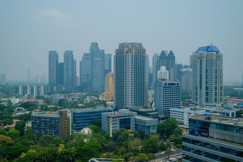 undefined Cozy 2BR Apartment with Sofa Bed at Tamansari Semanggi