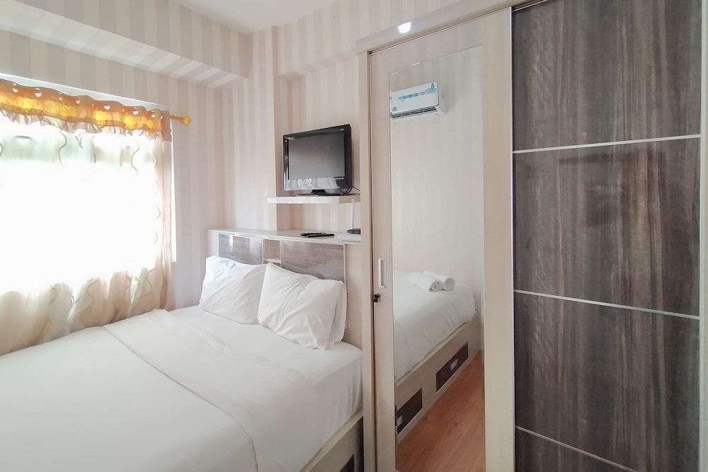 undefined Nice And Cozy 2Br At Green Pramuka City Apartment 4