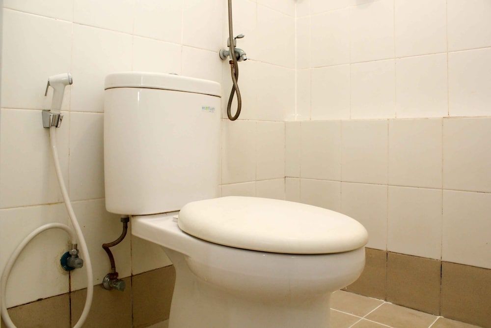 Minimalist and Warm 2BR Bassura City Apartment Room 7