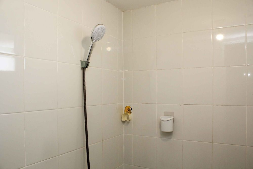 Minimalist and Warm 2BR Bassura City Apartment Room 8