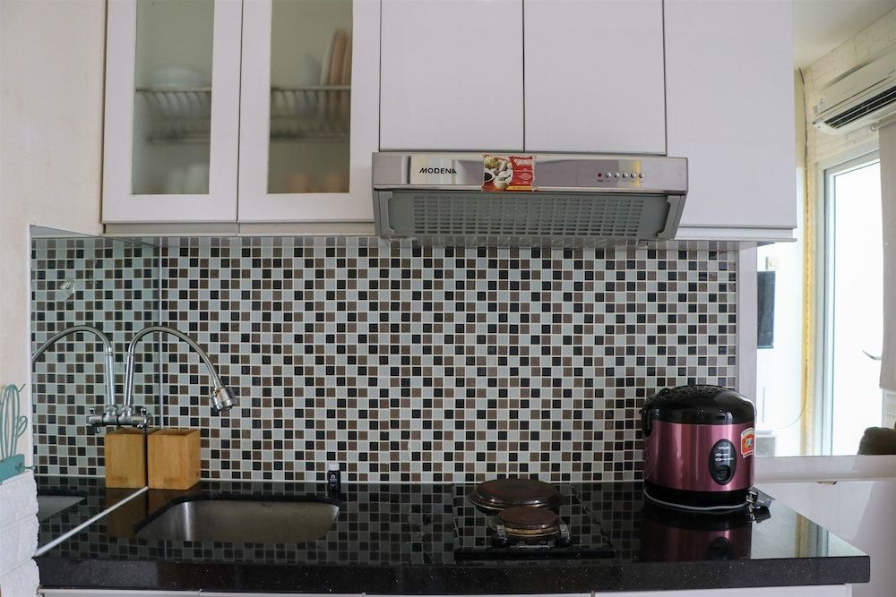 undefined Cozy Stay and Simply 2BR at Green Pramuka City Apartment 10
