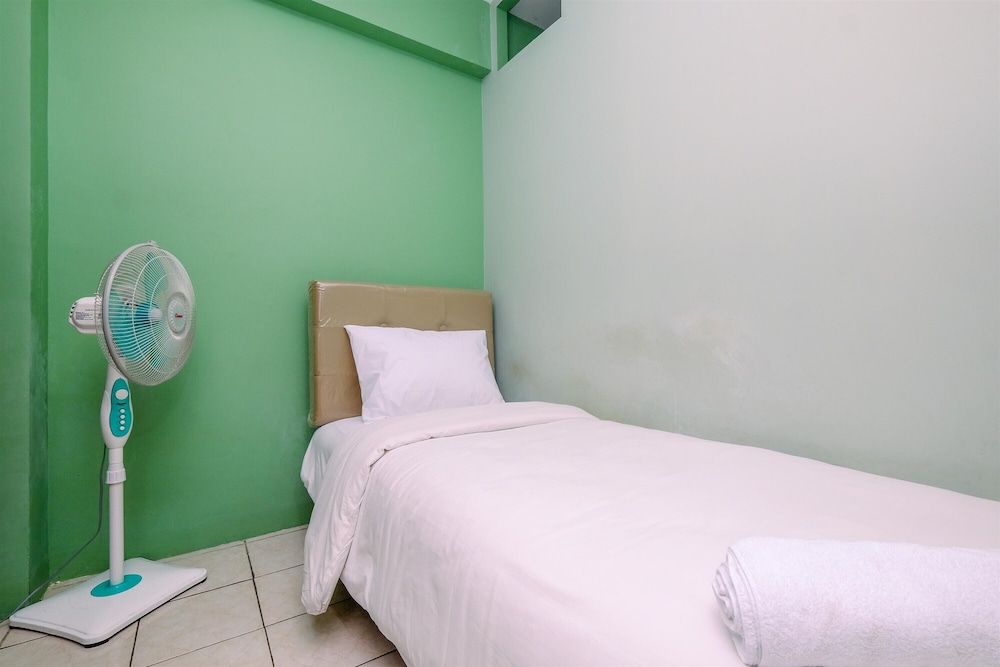 undefined Minimalist And Cozy Style 2Br At Green Pramuka City Apartment 7