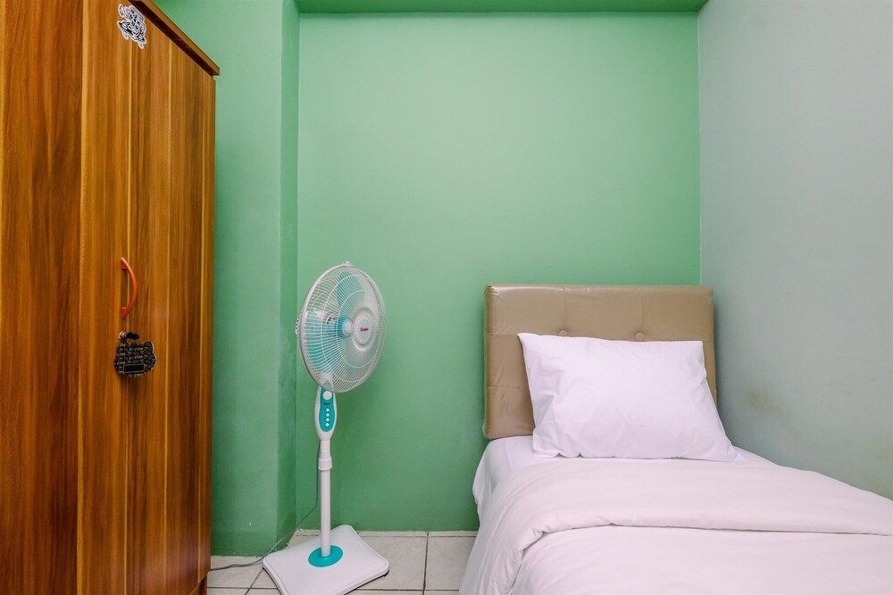 undefined Minimalist And Cozy Style 2Br At Green Pramuka City Apartment 10