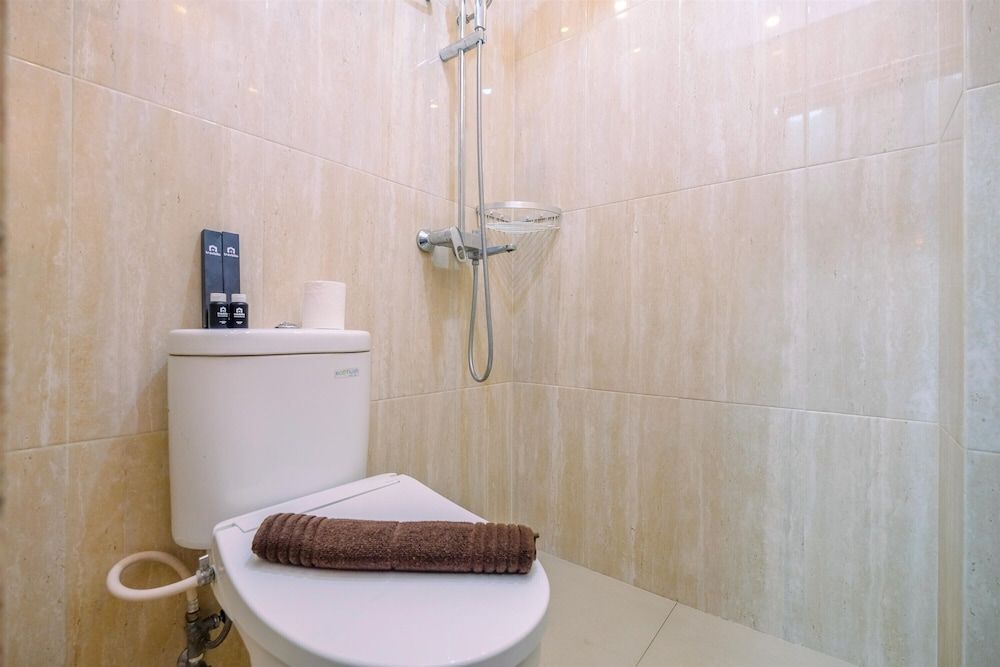 undefined Comfort And Cozy Living Studio Room At Tifolia Apartment 8