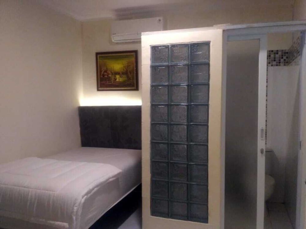 undefined Katalia Tomang