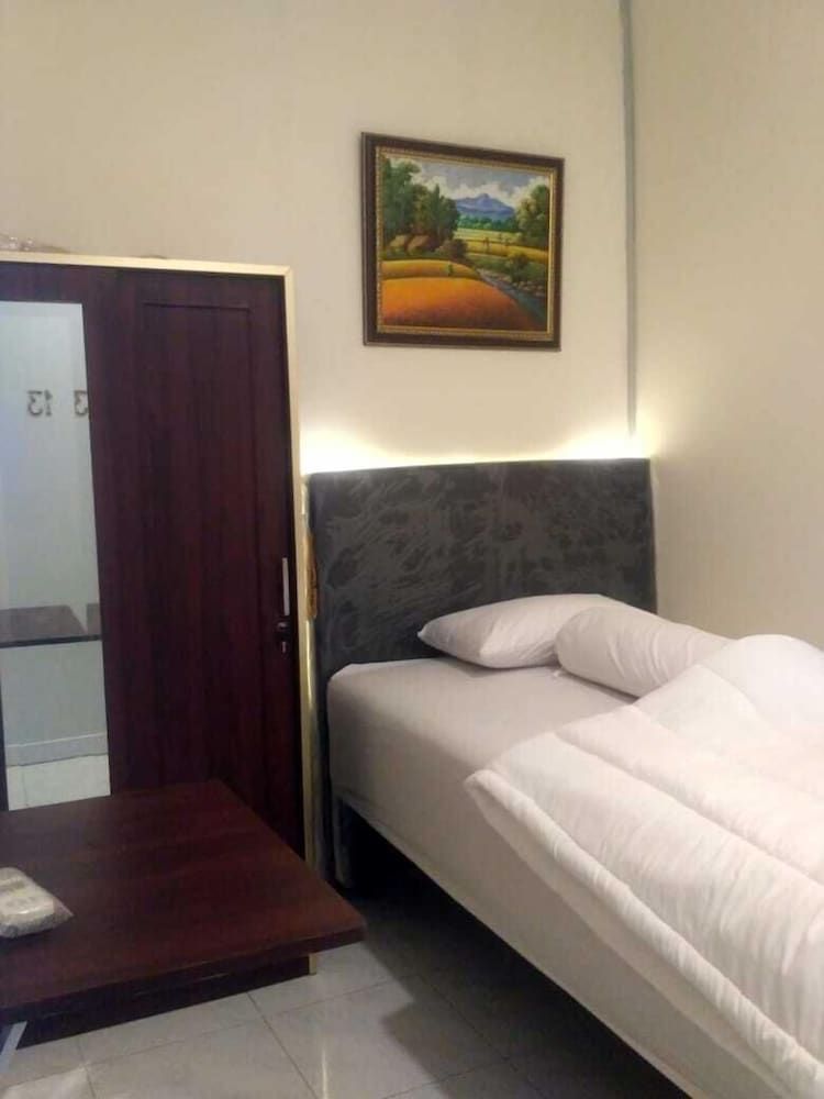 undefined Katalia Tomang 9