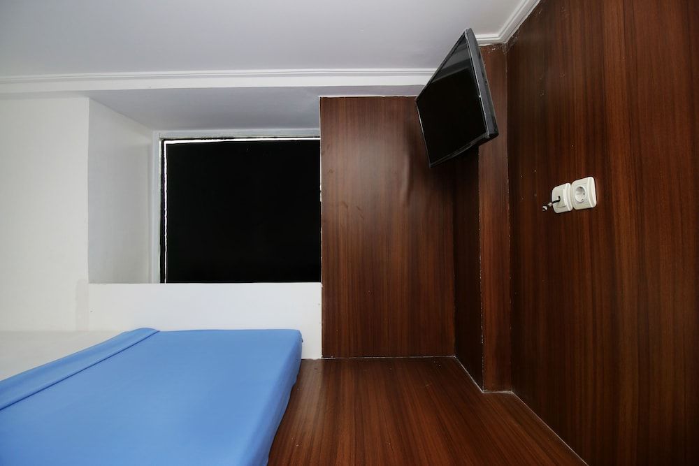 Kamar Keluarga Kemanggisan Syariah Double Room 11