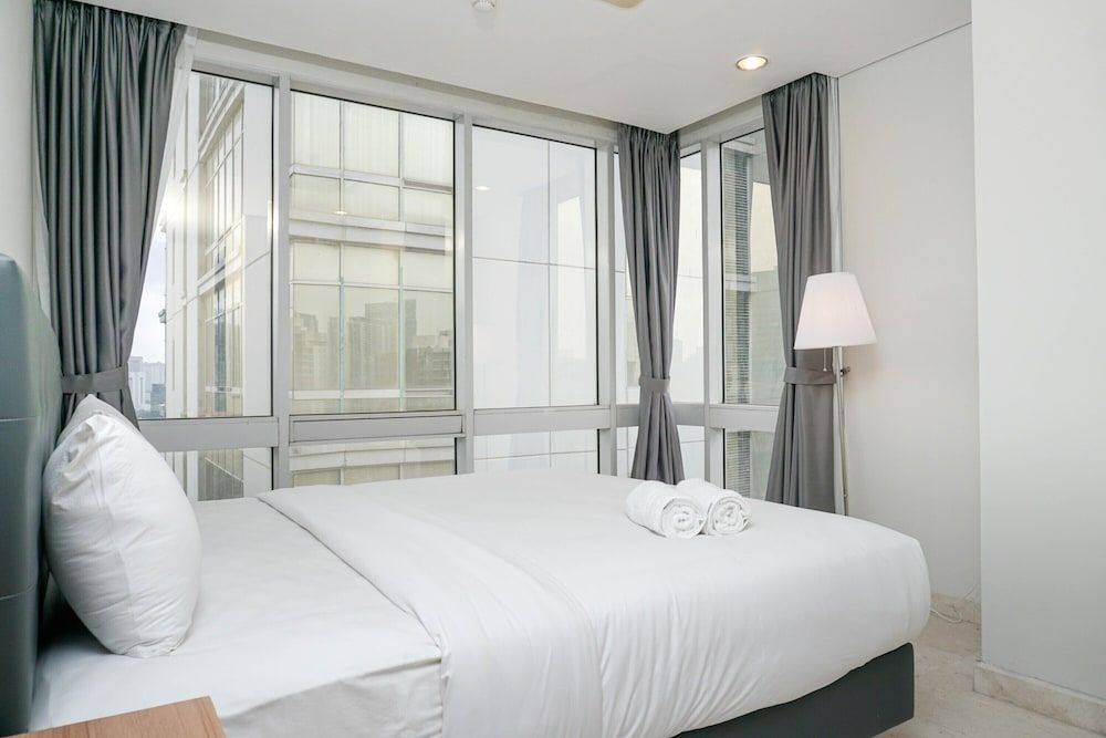 undefined Comfortable Deluxe 2BR at The Empyreal Condominium Epicentrum Apartment By Travelio 4