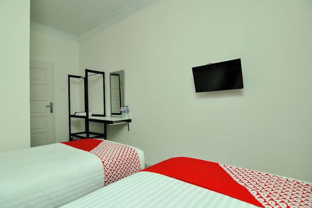OYO 721 Sulaiman Residence Syariah Standard Twin Room, 2 Twin Beds 5
