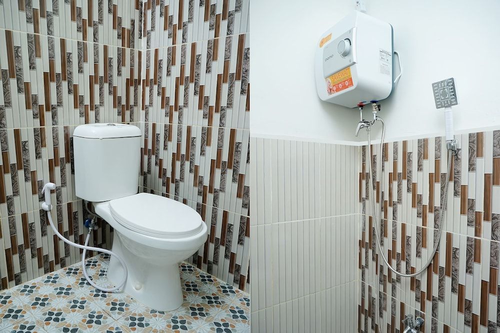 OYO 721 Sulaiman Residence Syariah Deluxe Double Room, 1 Double Bed 6