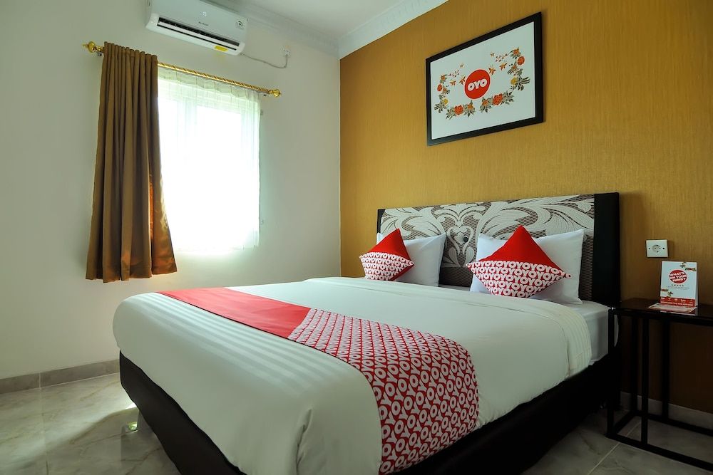 OYO 721 Sulaiman Residence Syariah Deluxe Double Room, 1 Double Bed 4