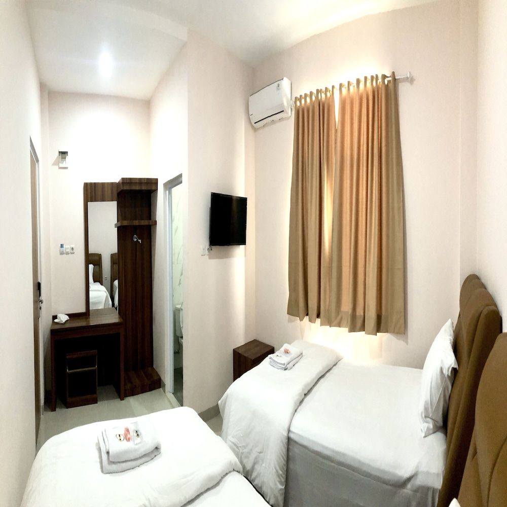 Selecta Indah Premium Twin Room 3