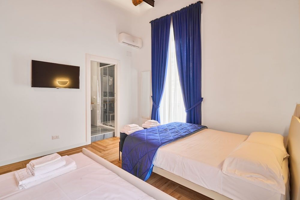 Toto e Peppino luxury rooms Superior Quadruple Room, Non Smoking, City View 3