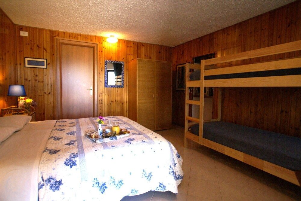 Il Querceto - B&B e Appartamenti Vacanze Classic Quadruple Room, 1 Bedroom, Refrigerator, Ground Floor 5