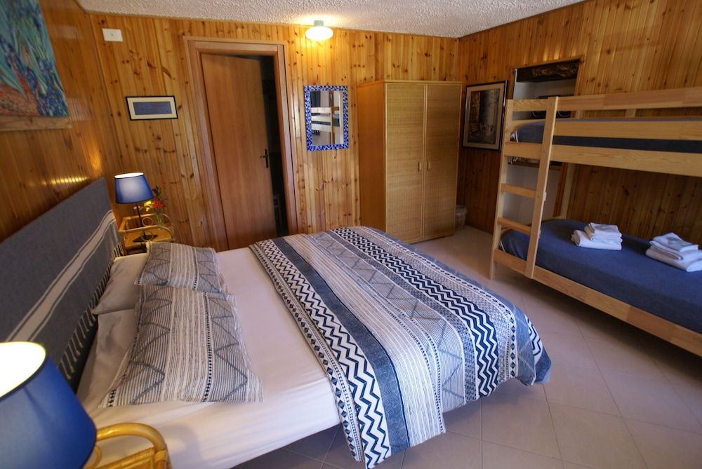 Il Querceto - B&B e Appartamenti Vacanze Classic Quadruple Room, 1 Bedroom, Refrigerator, Ground Floor 4