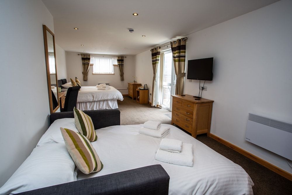 The Windmill Inn Deluxe Quadruple Room, 1 Bedroom 5