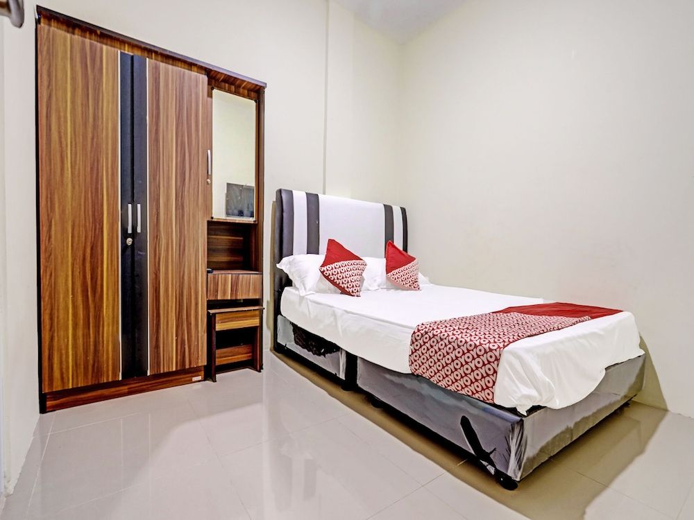 undefined SPOT ON 91500 Suci Homestay SyariahNearKilas 7 TV 10