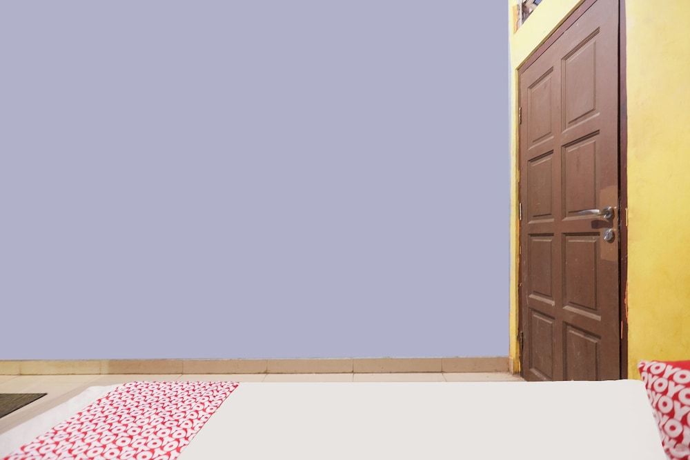 SPOT ON 91887 Penginapan Rindu Classic Double Room 5