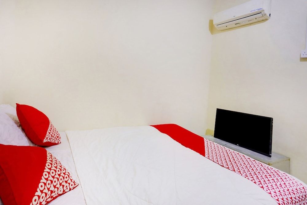SPOT ON 91422 Ringin Pitu 2 SyariahNearAnugrah Sinar Lautan Economy Double Room 3