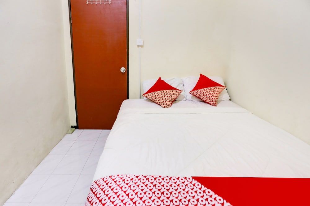 SPOT ON 91422 Ringin Pitu 2 SyariahNearAnugrah Sinar Lautan Economy Double Room 5