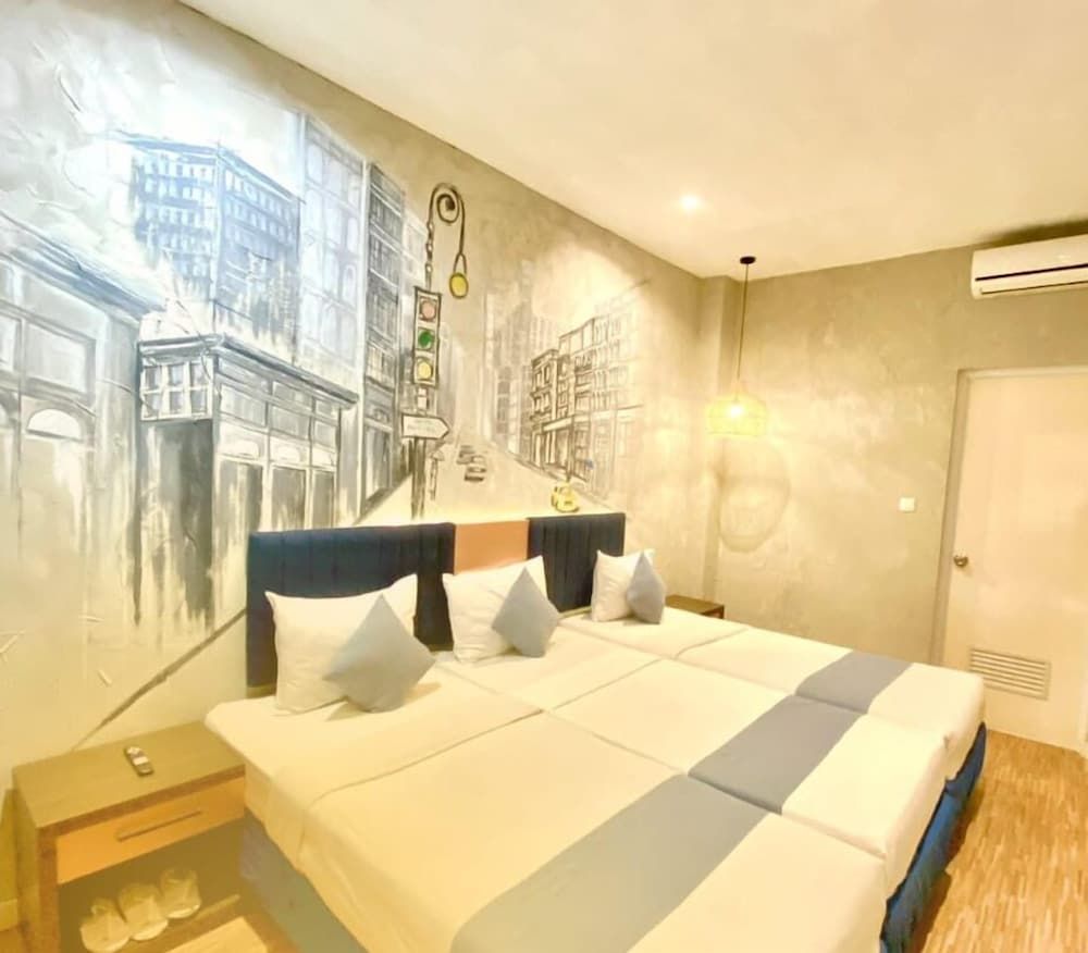 Pantes Hotel Semarang Family Triple Room, Multiple Bedrooms