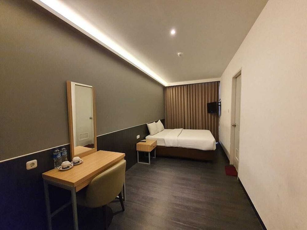 Pantes Hotel Simpang lima Semarang Deluxe Triple Room 2