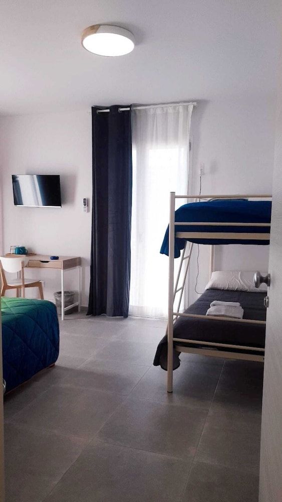 Casa Villaggio Pirandello Deluxe Quadruple Room 3