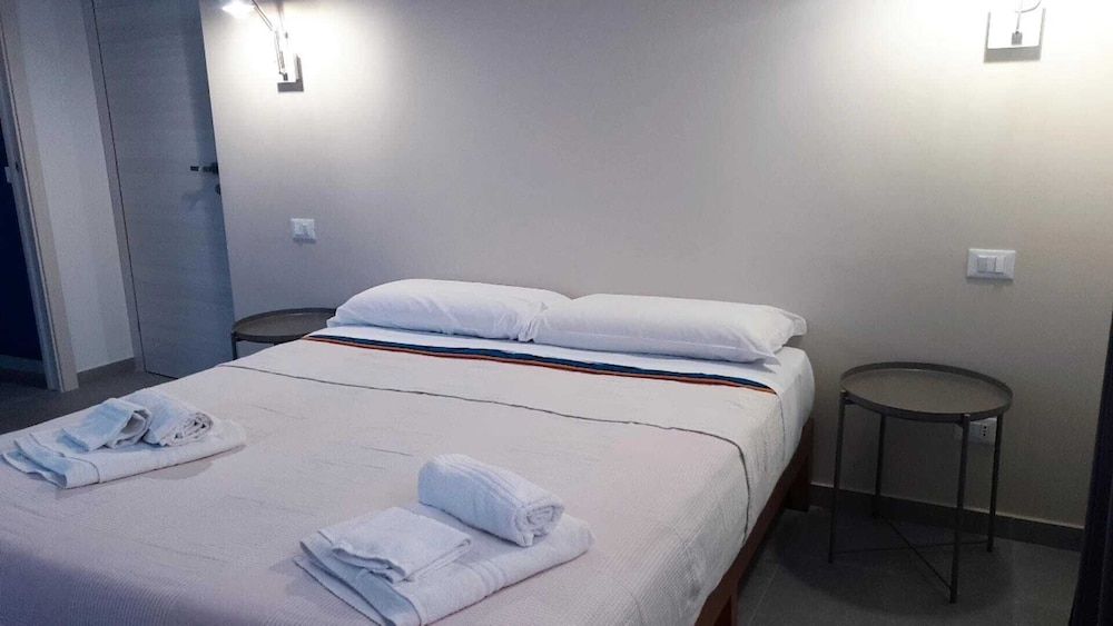 Casa Villaggio Pirandello Deluxe Quadruple Room 6