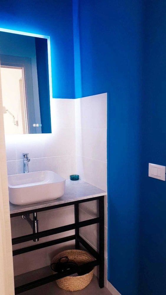 Casa Villaggio Pirandello Deluxe Quadruple Room 12