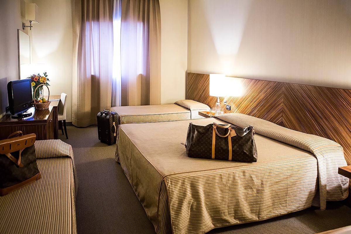 Triple Room (1 Double Bed + 1 Single Bed)