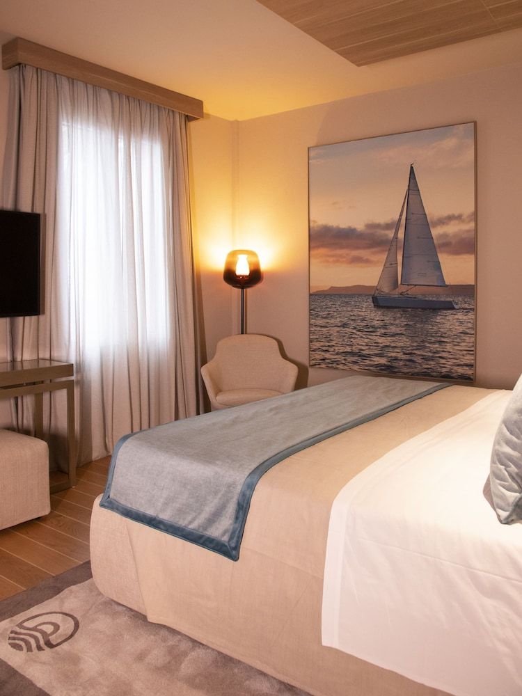 Miramare Suites One-Bedroom Suite with Balcony and Sea View of the Baia delle Favole 3