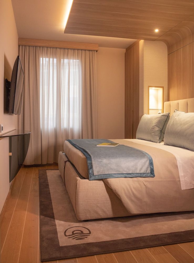 Miramare Suites One bedroom apartment, balcony, sea view of the Baia delle Favole