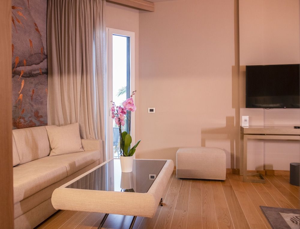 Miramare Suites One-Bedroom Suite with Balcony and Sea View of the Baia delle Favole 8