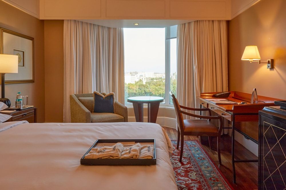 The Leela Mumbai Premier Room Pool View With 1+1 Happy hours are from 5pm to 7pm at 6 degrees on selected brands