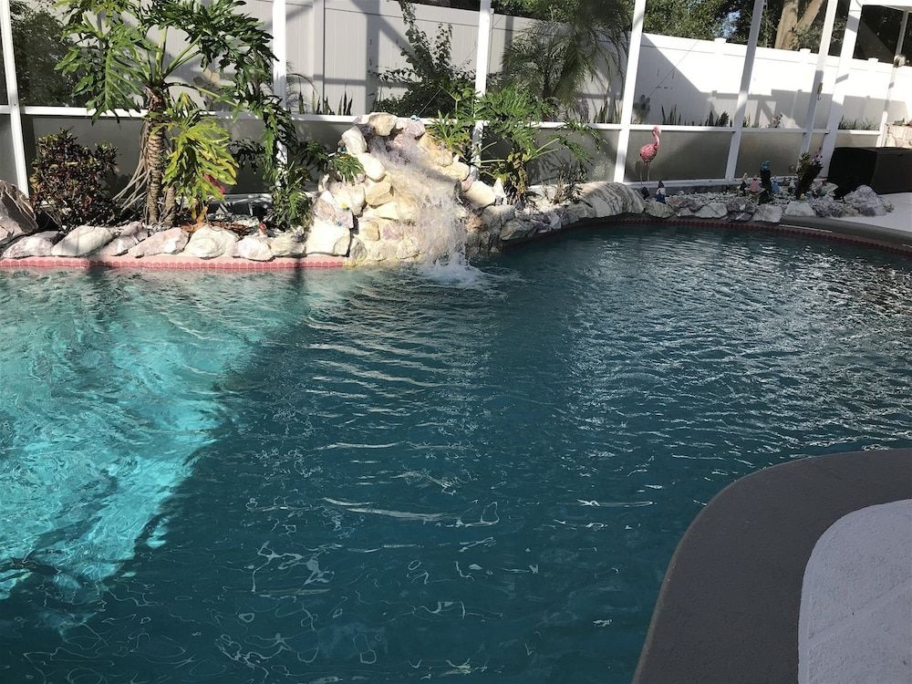 undefined 3 Bedroom Home With Private Screened Pool With Rock Waterfall Feature and Gameroom by Florida Dream Homes 7