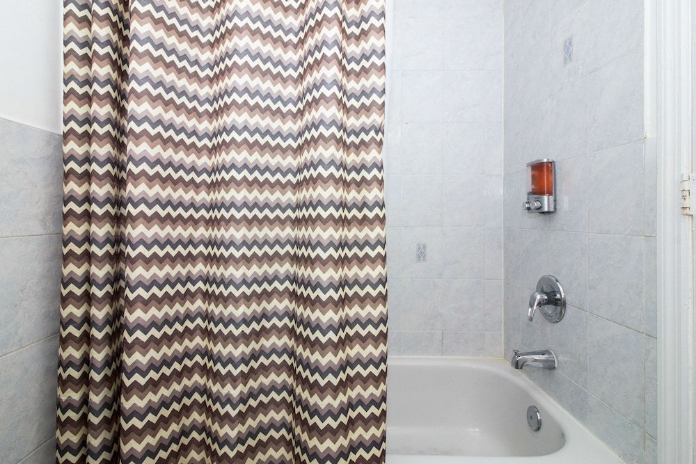 Racpanos Modern Stay on Ocean Avenue Deluxe Room, 1 King Bed with Sofa bed, Non Smoking, Shared Bathroom 12