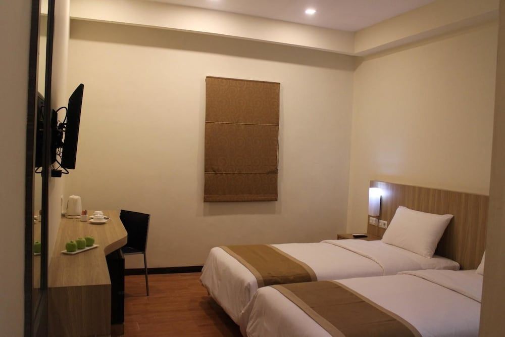 @Hom Premiere Abepura by Horison Deluxe Twin Room 2