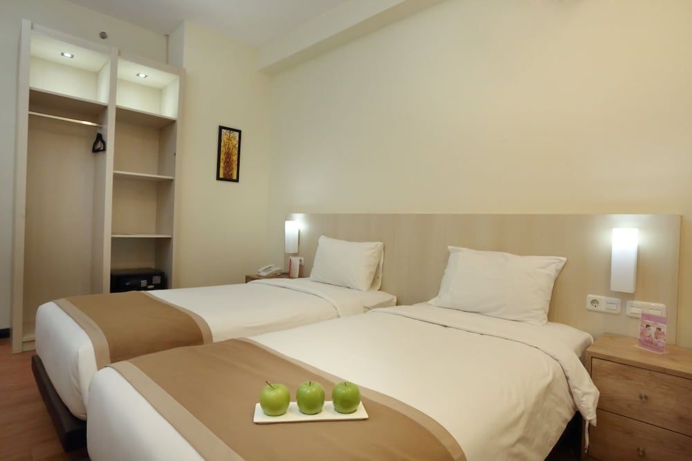 @Hom Premiere Abepura by Horison Deluxe Twin Room 3