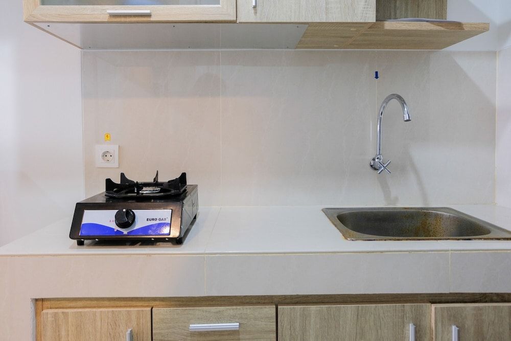 undefined Cozy Studio Room Apartment at Springwood Residence 10