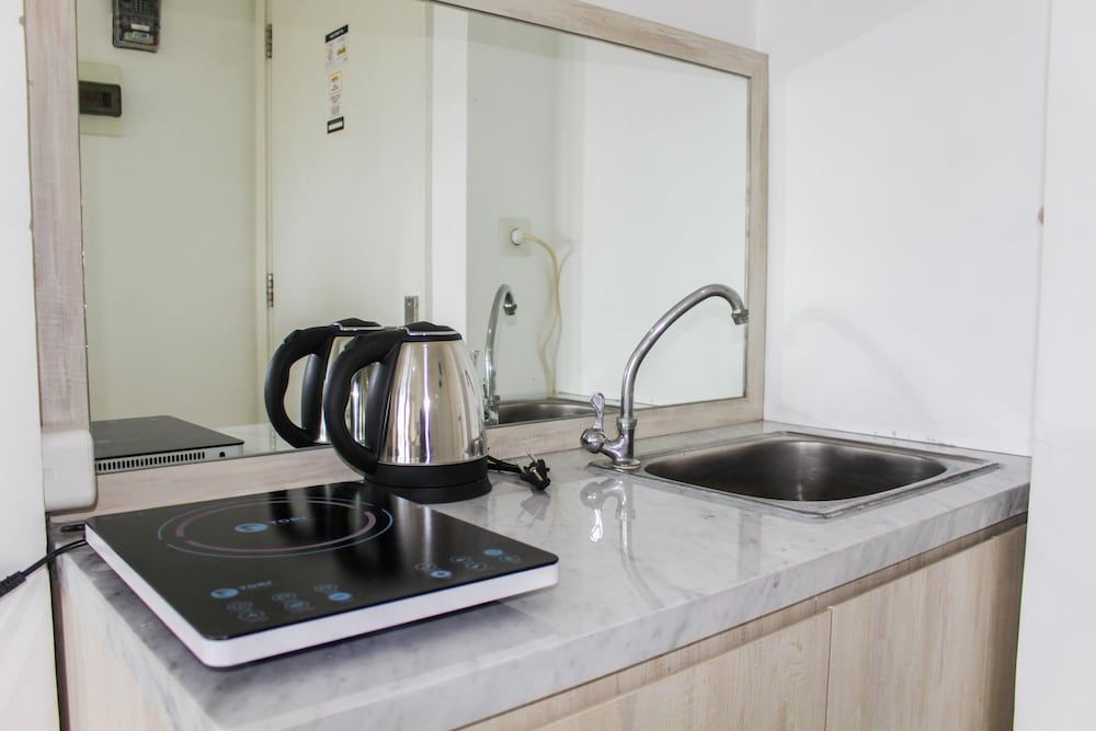 undefined Minimalist Studio Apartment at Poris 88 with City View 5