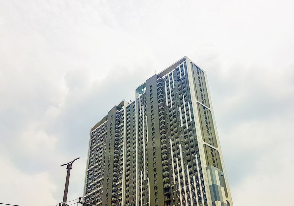 undefined Cozy Studio Apartment with Smart TV at Springwood Residence