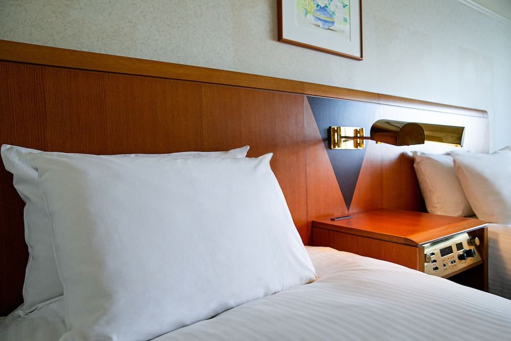 Grand Mercure Sapporo Odori Park Classic Room with 2 single beds and 1 sofa bed, City side