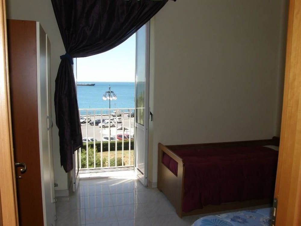 Quadruple Room, Shared Bathroom