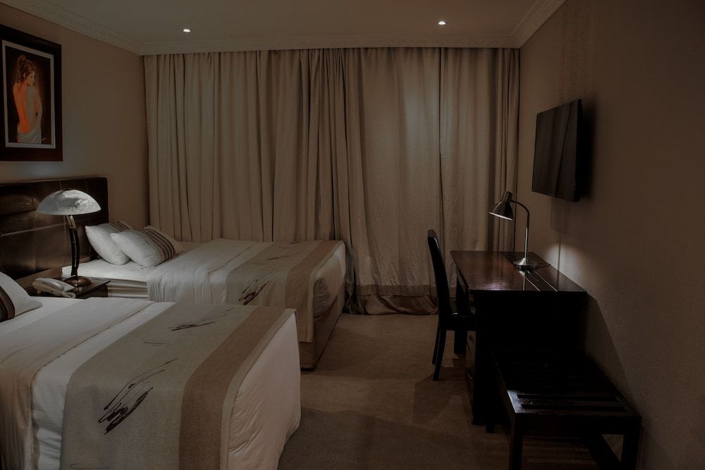 Zawadi House Deluxe Triple Room 4