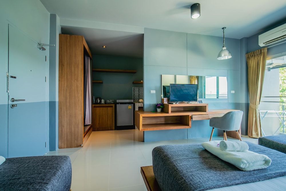 The Rubber Hotel Phuket Deluxe Triple Room 7