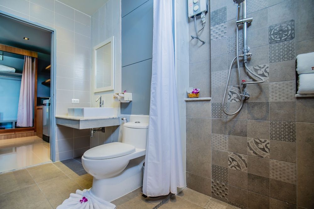 The Rubber Hotel Phuket Deluxe Triple Room 5