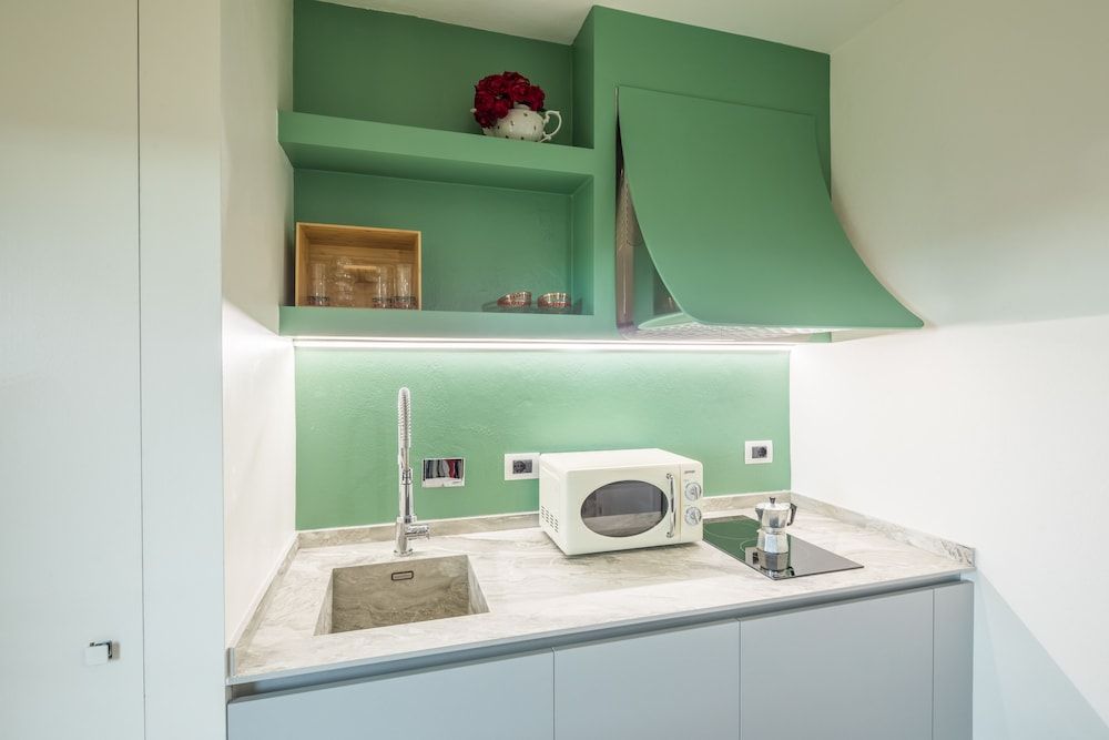 Bellavalle Rooms Design Triple Room, 1 Double Bed with Sofa bed, Kitchen, City View 3