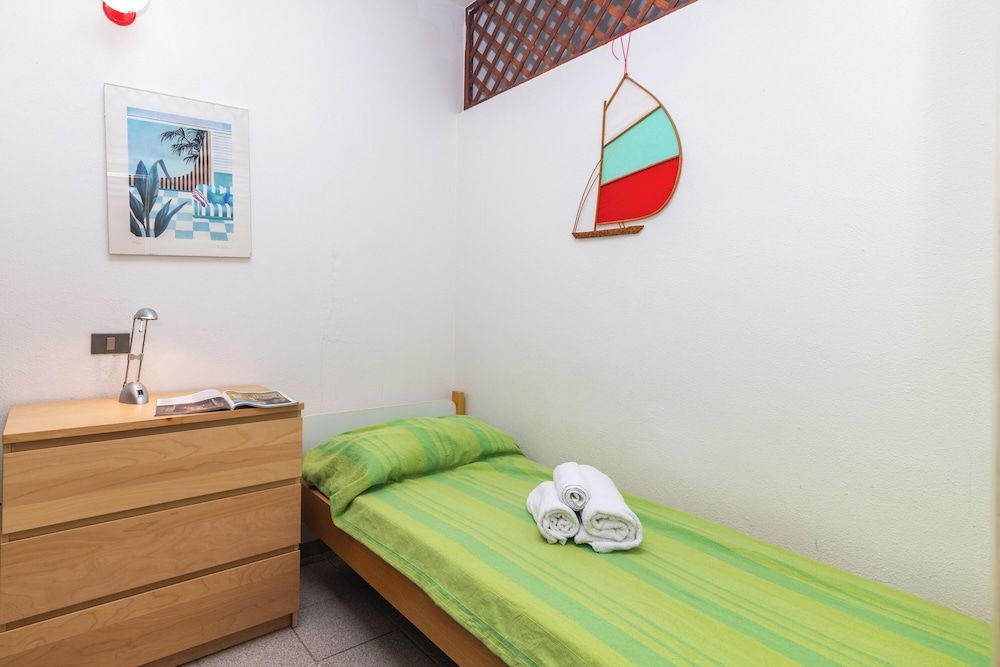 Family Apartment, 2 Bedrooms, 2 Bathrooms (I Fari C109 600Mt From The Beach)