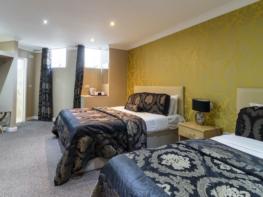 Stuart Hotel Standard Quadruple Room, 2 Double Beds 3